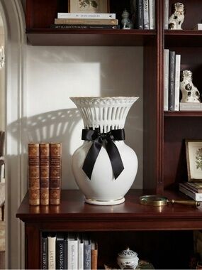 Vintage Formalities by Baum Bros. with a basket weave lattice